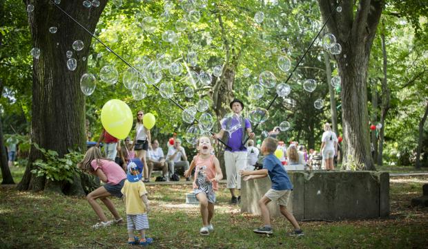 Soap bubble workshop, children playing and laughing